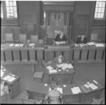 43 Wethouder H.E. van den Brule als loco-burgemeester in de gemeenteraadszaal Rotterdam.